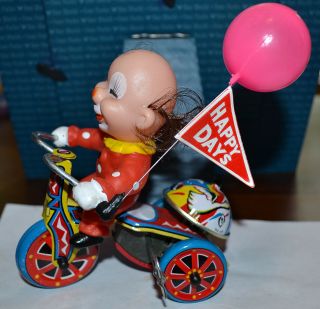 Vintage Tin Toy Wind Up Blow Mold Clown Riding Bike,  Bell Rings,  Great