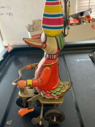 Vintage Wind Up Tin Toy " Duck On A Bike With Spinning Hat
