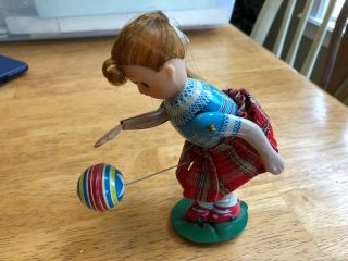 Pretty Little Girl With Ponytail Playing Bouncing The Ball Tin Toy Japan 1960s