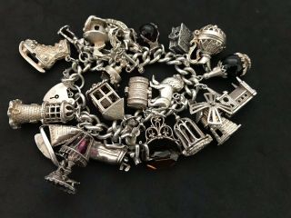 Vintage Sterling Silver Charm Bracelet with 22 Silver Charms.  143 grams 2