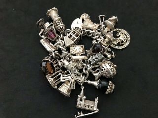 Vintage Sterling Silver Charm Bracelet with 22 Silver Charms.  143 grams 3
