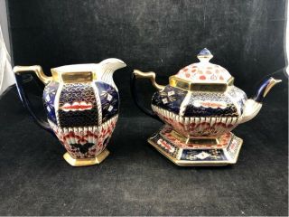 Antique British Teapot With Base And Matching Pitcher