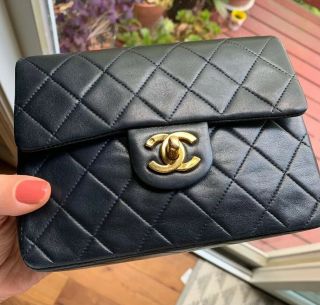 Unique And Classic Vintage Navy Chanel Mini Flap Bag With Gold Dipped Hardware