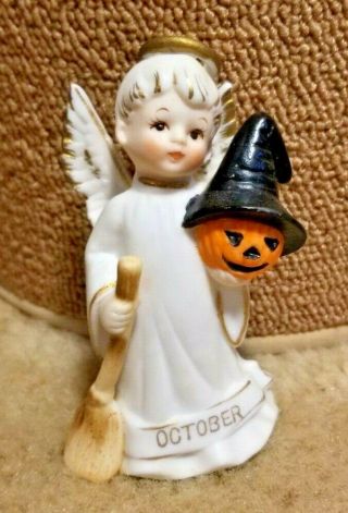 Porcelain October Angel Figurine 4.  25 " Tall Witches Hat & Broom,  Pumpkin 1952