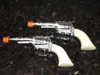 2 Vintage Tootsietoy Pony Boy Cap Gun Western Pistols