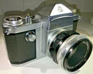 A rare vintage Pentax AP SLR for 35mm film with Takumar 55mm f2.  2 & case,  1950s 2