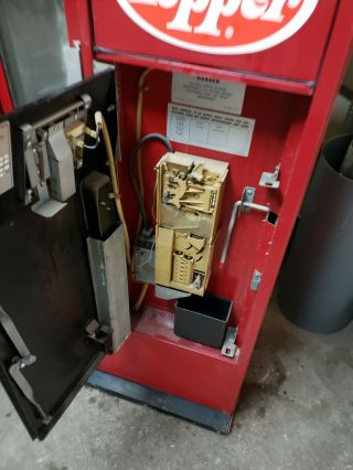 antique dr pepper machine.  coin mech and fridge perfectly 5