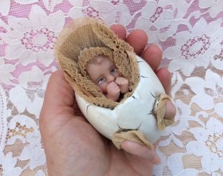 Antique Candy Container Wax Baby Doll Emerging From Composition Egg