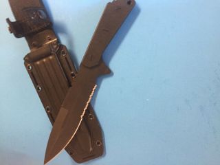 This Buck/Strider collaboration features a black spear point 890 Rare vintage 3