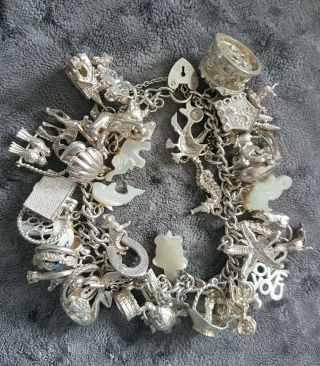 Vintage Real Sterling Silver Charm Bracelet With 43 Charms.