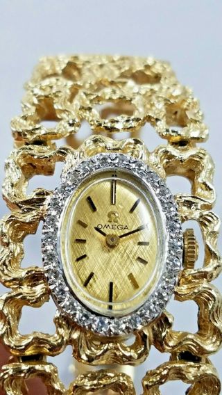 WOMEN ' S RARE LARGE OMEGA 14K GOLD AND DIAMOND WATCH RUNS MODERNIST 3