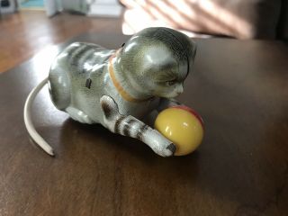 Vintage Tin Wind Up Cat Chases Ball Tail Spins U.  S.  Zone,  Germany