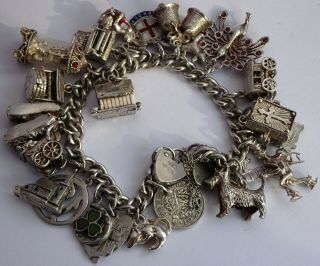 Vintage Heavy Solid Silver Charm Bracelet & 23 Charms.  Nuvo,  Open,  Move