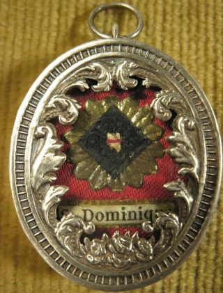 ANTIQUE & ORNATE SILVER THECA CASE WITH A RELIC OF ST.  DOMINIC - FOUNDER. 2