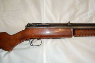 vintage benjamin 312 rifle,  rebult,  holds air,  shoots 475fps /4 pumps,  wood 4