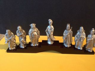 Set Of 7 Chinese Pewter Dynasty Figures On A Podium