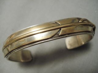 Thick And Heavy Important Vintage Navajo Gold Sterling Silver Feather Bracelet