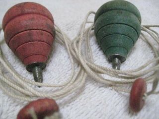 Two Old Vintage Wooden Spinning Tops With String And Wooden Stri