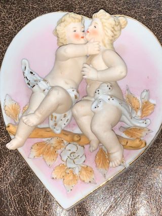 ANTIQUE PORCELAIN PUTTI RELIEF WALL PLAQUES,  2 CROSSED ARROWS MARK MADE IN JAPAN 2