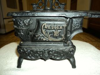 Vintage Cast Iron Miniature Wood Burning Stove by Crescent w/. 2
