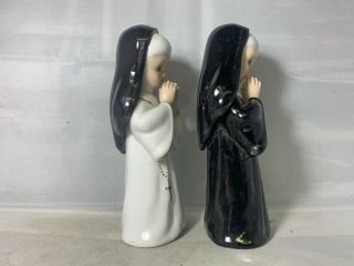 Porcelain Nun Figurines L & M,  1956 2