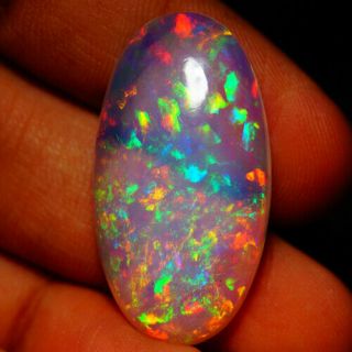 22.  00 Ct One Of A Kind Extremely Rare Ethiopian Opal With White Based Water Body