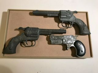 Group Of 3 Toy Pistols: Hubley And American West Frontier