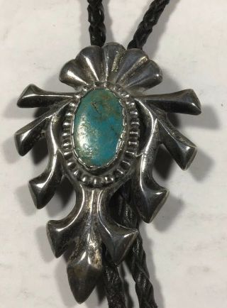 Vintage Sterling Silver Sand Cast Bolo With Turquoise Center
