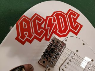 Angus Young & Malcolm Young AC/DC signed rare full size electric guitar.  JSA 6