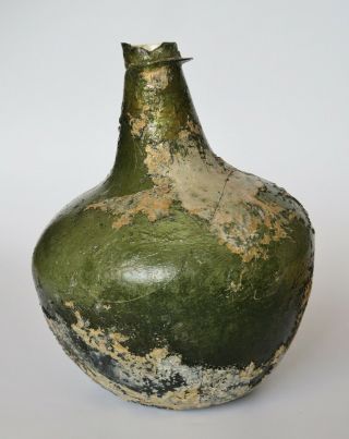 An Extremely rare and early SHAFT AND GLOBE ENGLISH WINE BOTTLE,  1660 - 1670. 3