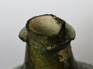 An Extremely rare and early SHAFT AND GLOBE ENGLISH WINE BOTTLE,  1660 - 1670. 6