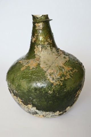 An Extremely rare and early SHAFT AND GLOBE ENGLISH WINE BOTTLE,  1660 - 1670. 9