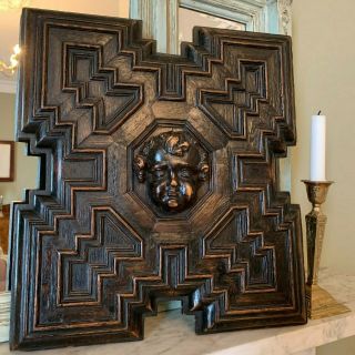 Early 17th Century Hand Carved Oak Panel With Central Cherub Geometric Design