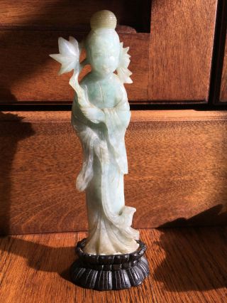 A Rare Chinese Qing Dynasty Carved Jadeite Guanyin Statue with Wooden Stand. 11