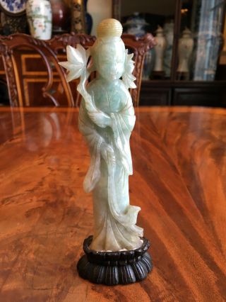 A Rare Chinese Qing Dynasty Carved Jadeite Guanyin Statue With Wooden Stand.