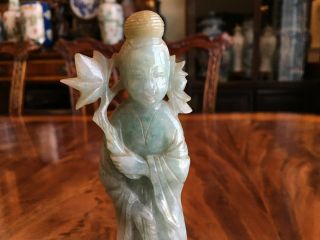 A Rare Chinese Qing Dynasty Carved Jadeite Guanyin Statue with Wooden Stand. 4