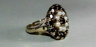 VINTAGE 9CT GOLD RING.  GARNETS AND PEARLS.  SIZE K. 3
