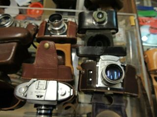8 Vintage 35 mm cameras Kodak,  Graphic,  Exakta,  Argus,  Voigtlander,  Praktica,  Minolta 2