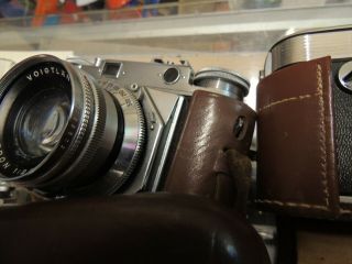 8 Vintage 35 mm cameras Kodak,  Graphic,  Exakta,  Argus,  Voigtlander,  Praktica,  Minolta 9