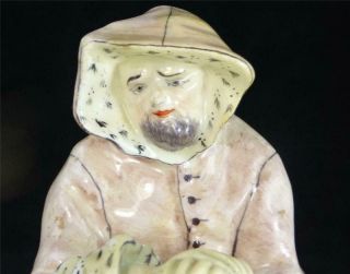 N938 C1758 ANTIQUE POLYCHROME BOW PORCELAIN FIGURE EMBLEMATIC OF WINTER 2