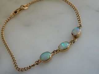 A 9 Ct Gold Oval Opal Bracelet