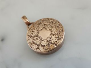 A 9 CT ROSE GOLD ANTIQUE FOLIATE ENGRAVED LOCKET 2