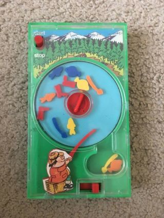 1976 Tomy Pocket Game Fishing Handheld Travel Game Windup Fishing Great