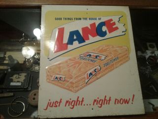 Good Things From The House Of Lance.  Just Right.  Right Now Antique Old Sign