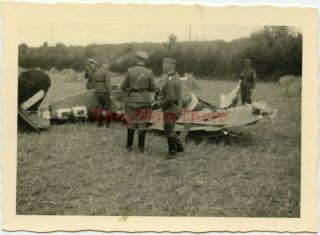 Wwii Photo - German Soldiers Inspect Shot Down Raf Spitfire Fighter Plane - Sad