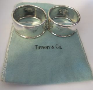 TWO ANTIQUE TIFFANY AND CO.  STERLING SILVER NAPKIN RINGS W/POUCH 6