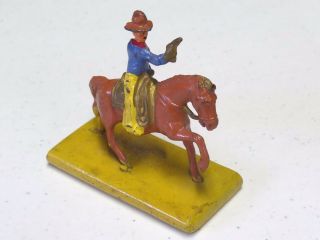 Vintage Metal Lead Cowboy Riding Horse Six Shooter Drawn Barclay