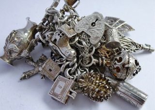 Wonderful Vintage Solid Silver Charm Bracelet & 29 Charms.  Rare,  Open,  Move.  109.  9g