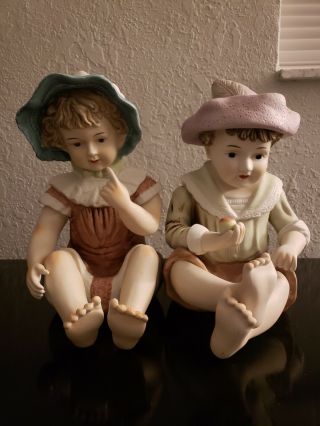 Rare Vintage Large German Bisque Piano Babies Girl W/ Hat And Boy W/ Apple