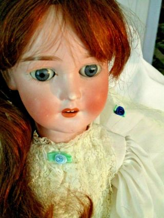 Antique Pansy II,  Bisque Doll 22.  5 